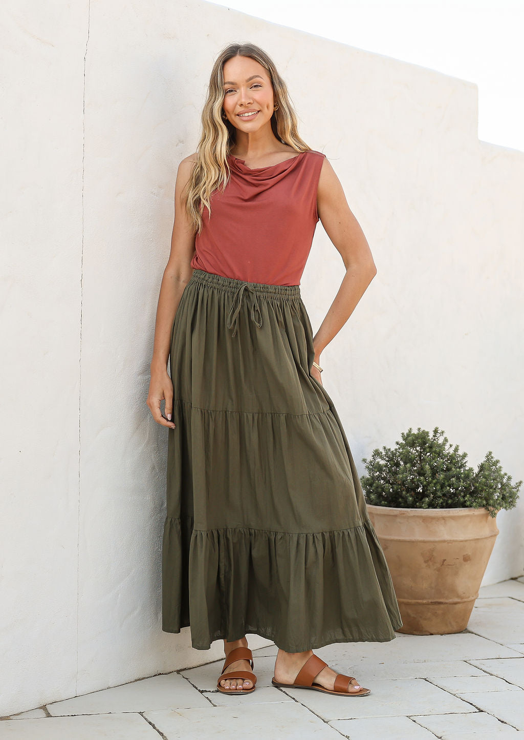 Woman wearing a Maxi Skirt in plain olive green shade, 100% cotton skirt with drawstring waistband