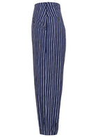 Side view of 100% cotton wide leg cotton pant with navy blue based print with side zip.
