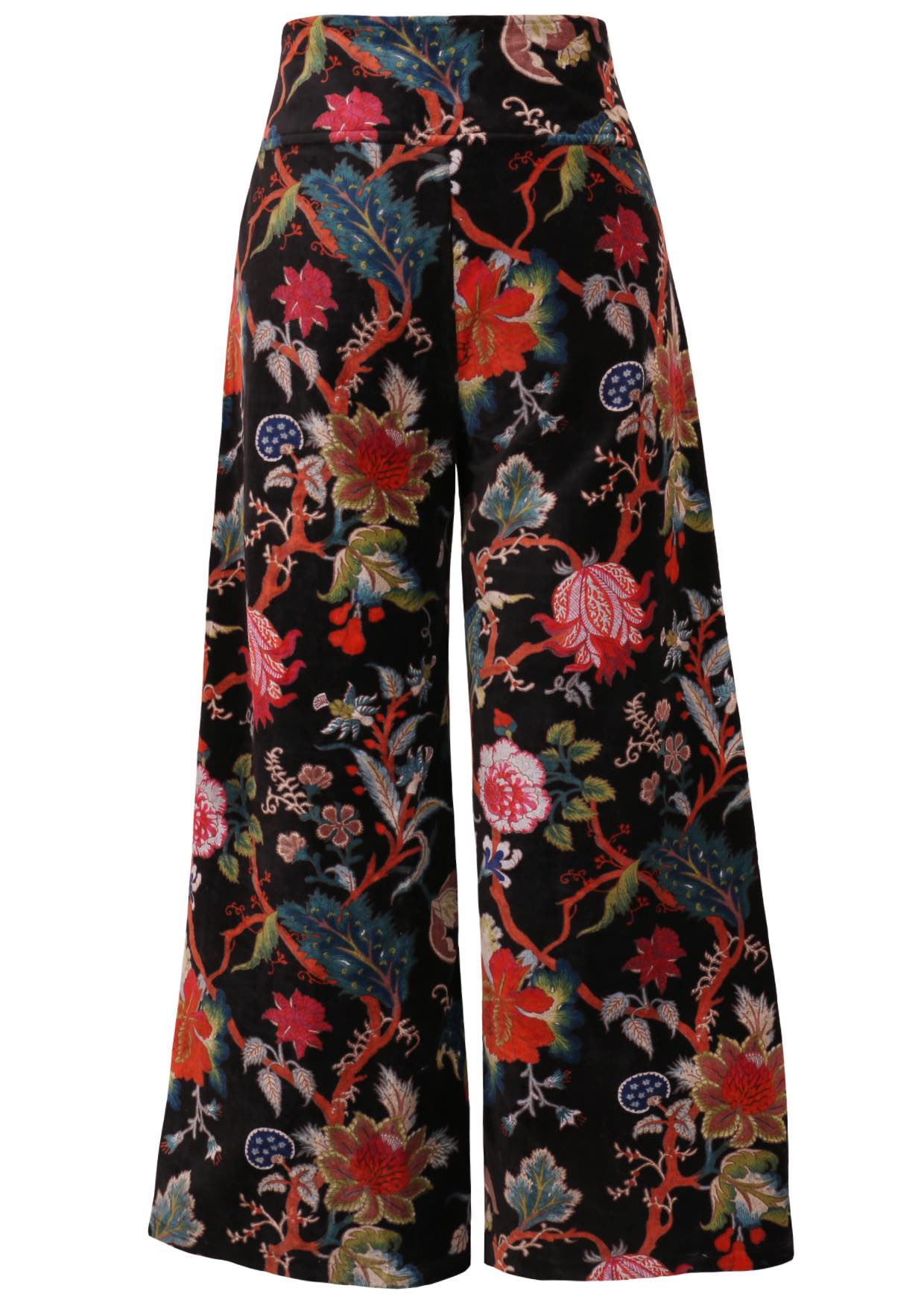 Back view of black based multi-colour floral velvet wide leg full length pants with a wide waistband