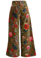 Back view of moss green based multi-colour floral velvet wide leg full length pants with a wide waistband