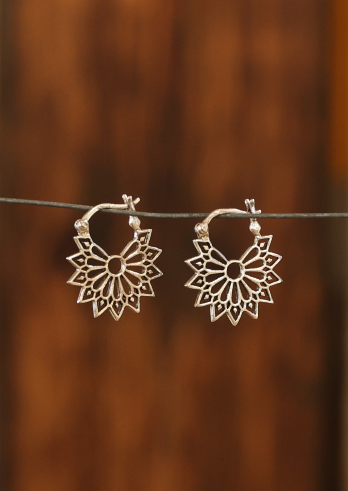 Sterling silver starburst earrings with hinged clasp