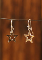 Sterling silver star earrings with hole in centre, suspended on hooks