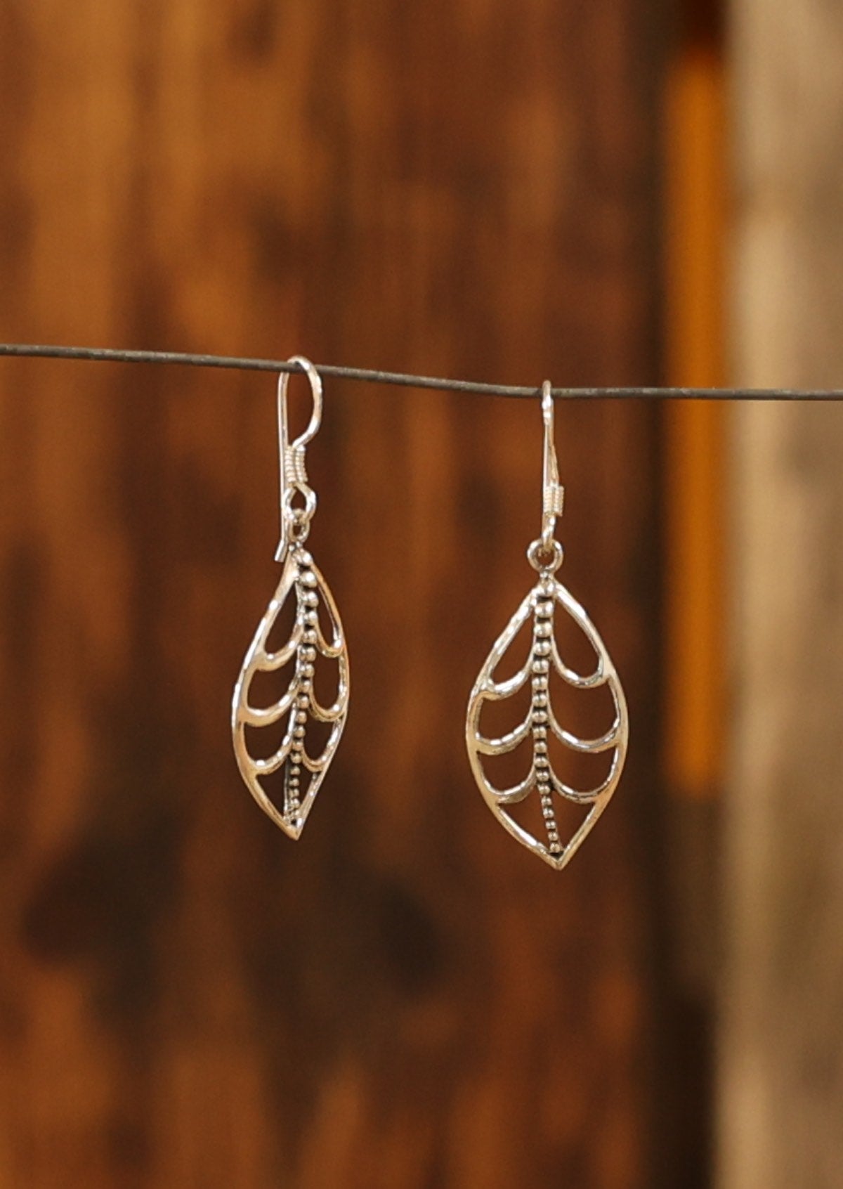 Sterling silver hook earrings with beautiful leaf skeleton