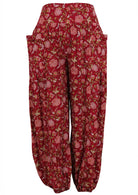 Cotton harem pants with elasticated ankle and deep pockets in cranberry based floral print