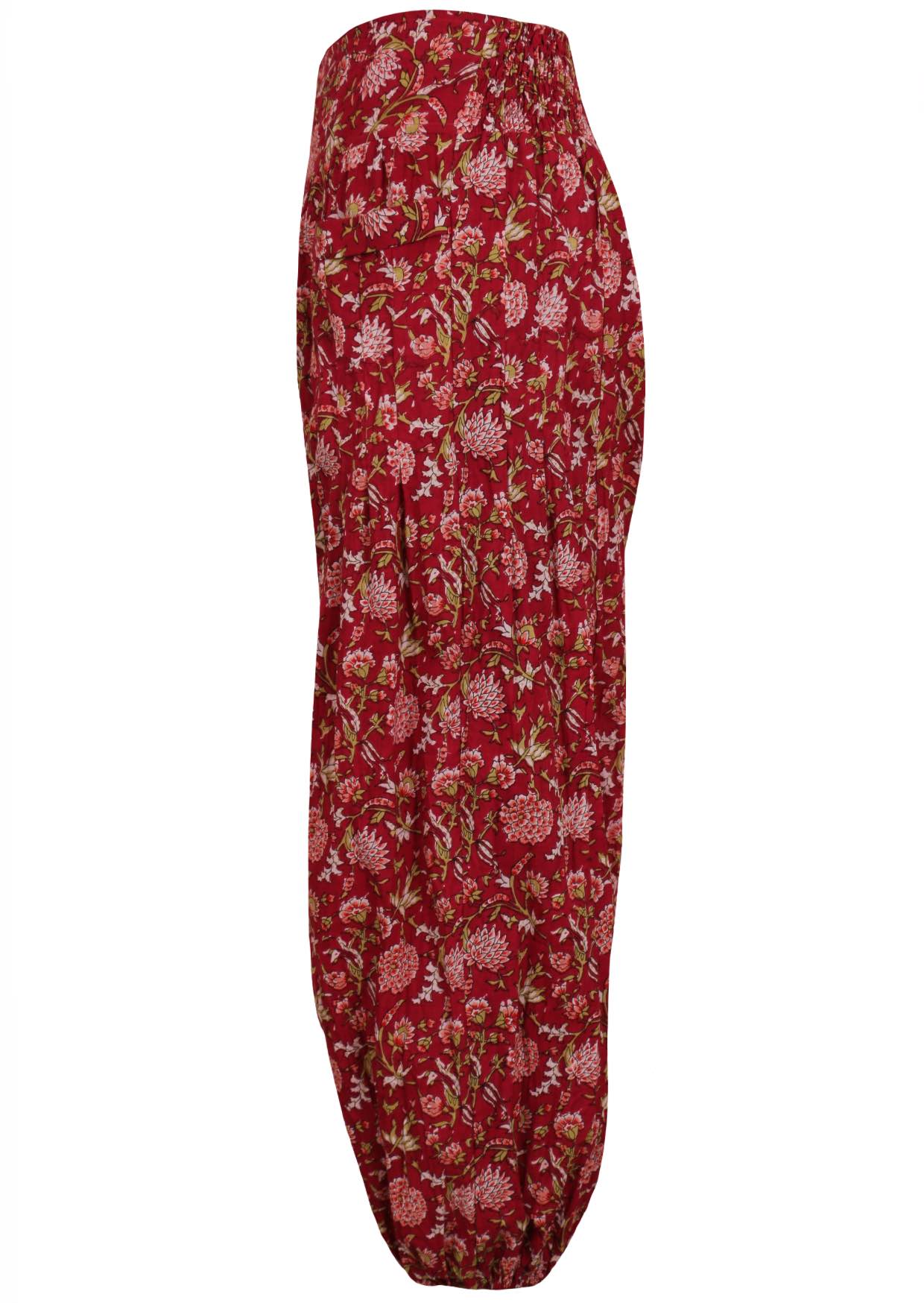 Cotton harem pants with elasticated ankle, elastic at back of waistband and deep pockets in cranberry based floral print