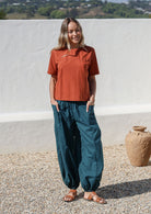 Pilot Pants high-mid waist waistband elasticated back flat front loose fitted leg elasticated at ankles front pockets 100% cotton light weight deep teal