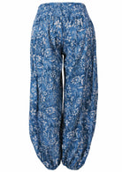 Pilot pants side in blue floral Drift print 100% cotton with a wide elasticated waistband, pockets, and elastic around the ankles 