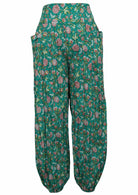 Front mannequin photo of 100% cotton harem style pants with elasticated ankles and deep pockets