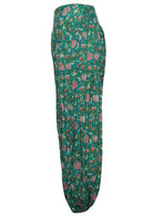 Side mannequin photo of 100% cotton harem style pants with elasticated ankles and deep pockets