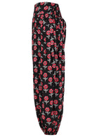 Black based floral print cotton harem pants with elasticated back waistband.