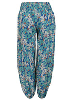 Royal blue based floral print harem cotton pants with buttoned ankles.