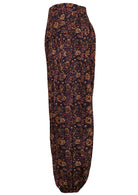 Side image of 100% cotton pants with elastic at the back of waist and ankles. 