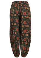 Lightweight cotton harem pants with elastic waistband and deep pockets in dark green vanya print.