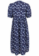 100% Cotton floral shin length dress in navy blue with empire waistline, pockets and mandarin collar