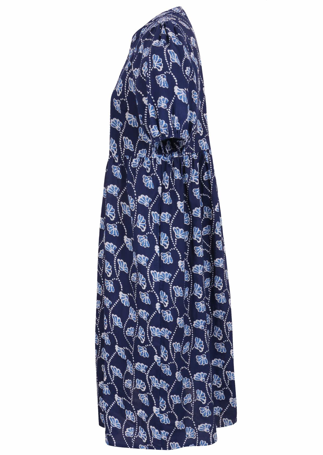 Side view of navy blue floral printed cotton midi length button through dress  with hidden side pockets.