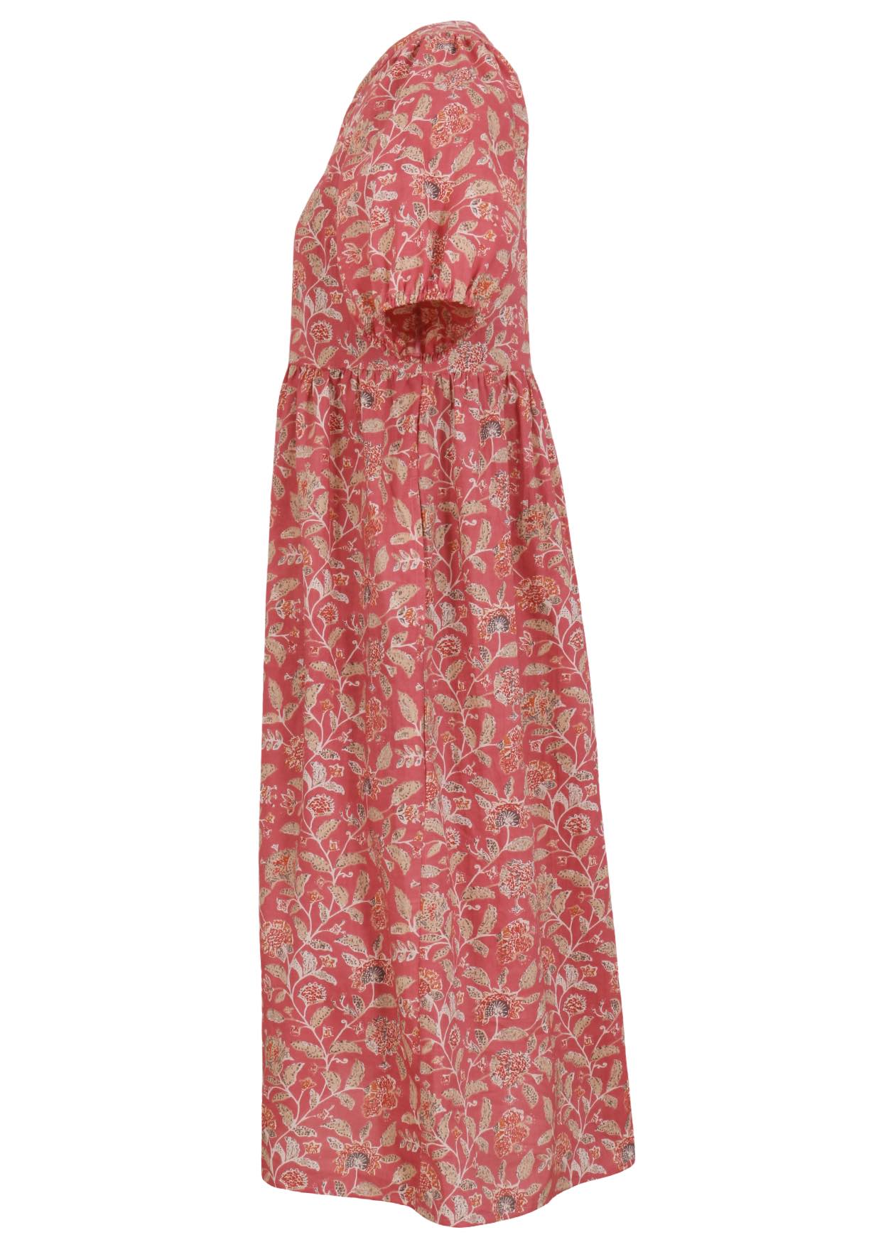 Side view of dusky pink floral print cotton midi length button through dress with voluminous elbow length sleeves