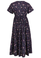 Dark purple floral cotton dress has shoestring ties to cinch at the back of dress