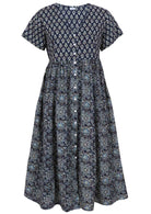 Front view of navy blue based floral print V-neck cotton dress.