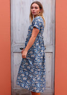 T-shirt sleeve relaxed fit lightweight cotton dress with ties to cinch  at the back