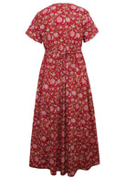 Back mannequin photo of cotton relaxed fit  dress with T-shirt sleeves and shoestring ties in floral print on a bright red base