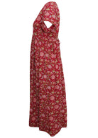 Side mannequin photo of cotton relaxed fit  dress with T-shirt sleeves and shoestring ties in floral print on a bright red base