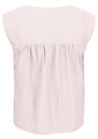 Back mannequin photo of cotton sleeveless top with gathers across shoulder blades, in natural white