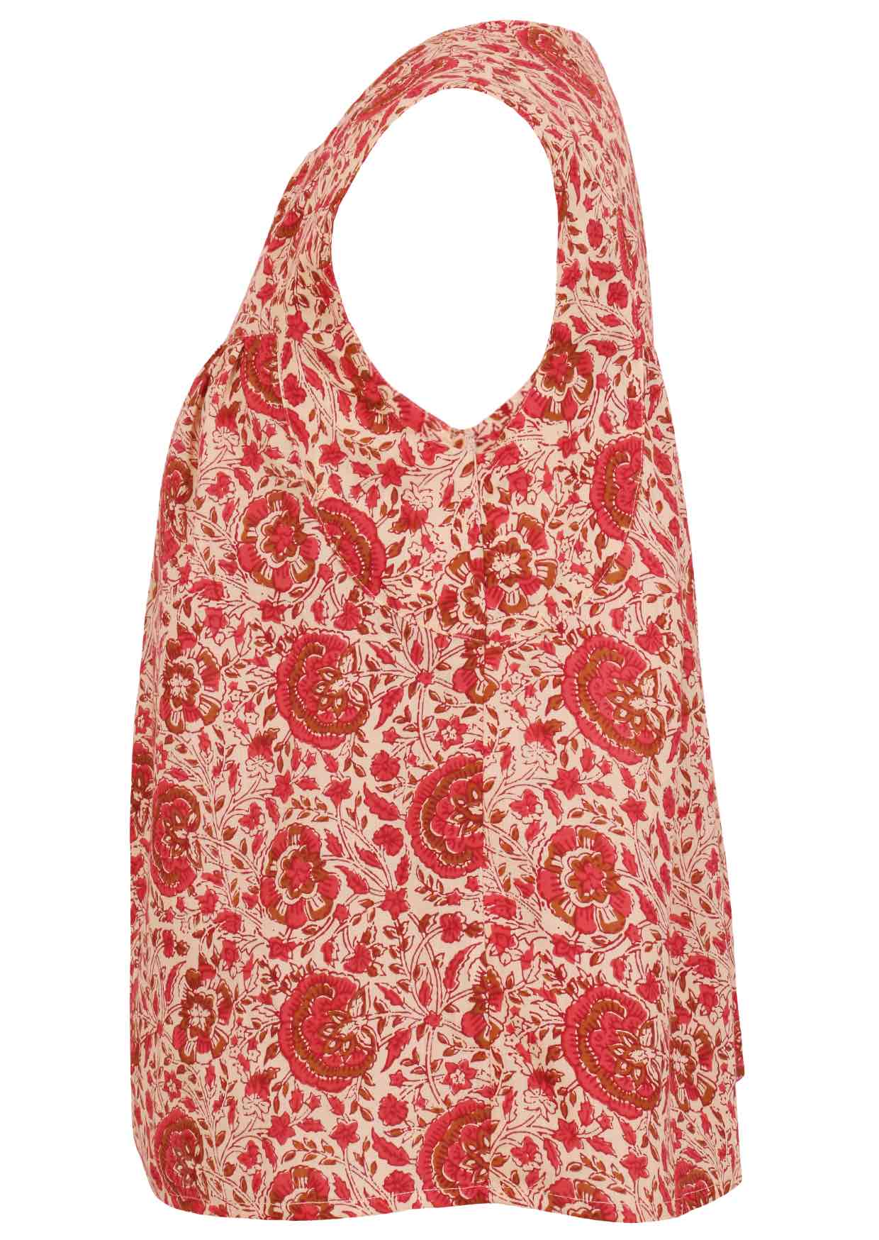Cap sleeves cotton top with cream based warm floral print on a white background