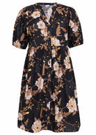 V-neck cotton dress with black based floral print