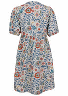Elbow length sleeve cotton dress with white based floral print.