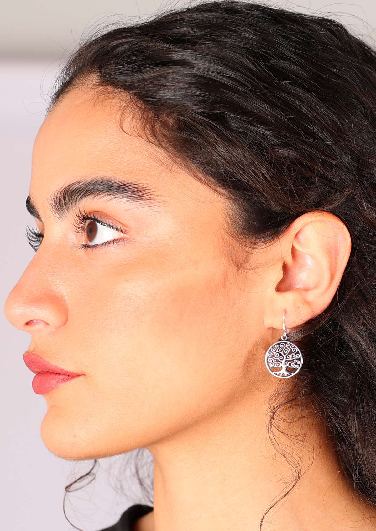 Model wears gorgeous Klimt Tree of Life tribute silver earrings