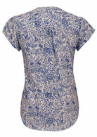 White based blue floral print cotton top on a white background.