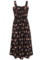 Back view of black based floral sleeveless dress with pockets and elasticated back