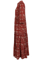 Red floral patterned maxi dress with three tiered flowy skirt, pockets and 3/4 sleeves