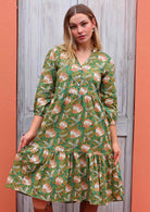 Lightweight cotton green floral relaxed fit dress with 3/4 sleeves and hidden side pockets