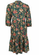 Loose fit cotton midi dress with mandarin collar, 3/4 sleeves and pockets.