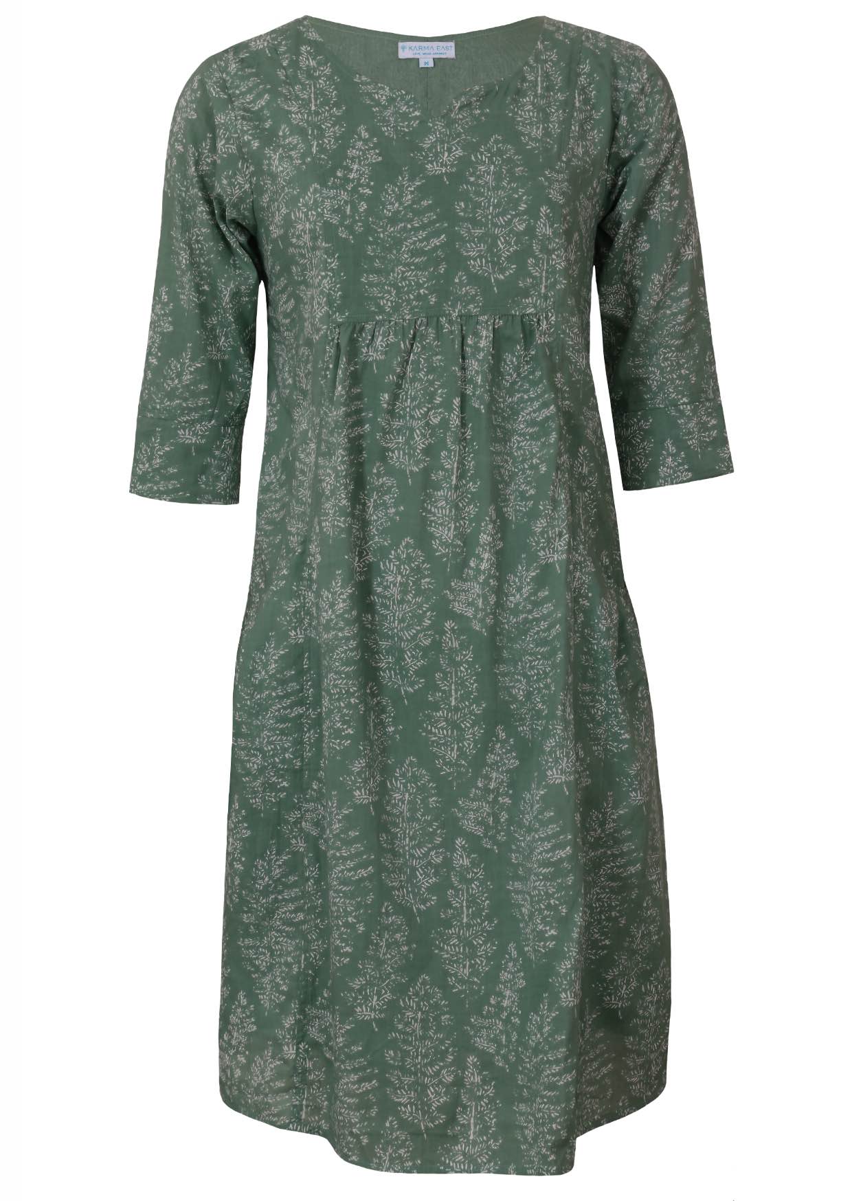 Relaxed fit below knee length cotton dress with 3/4 sleeves, pockets and round neckline.