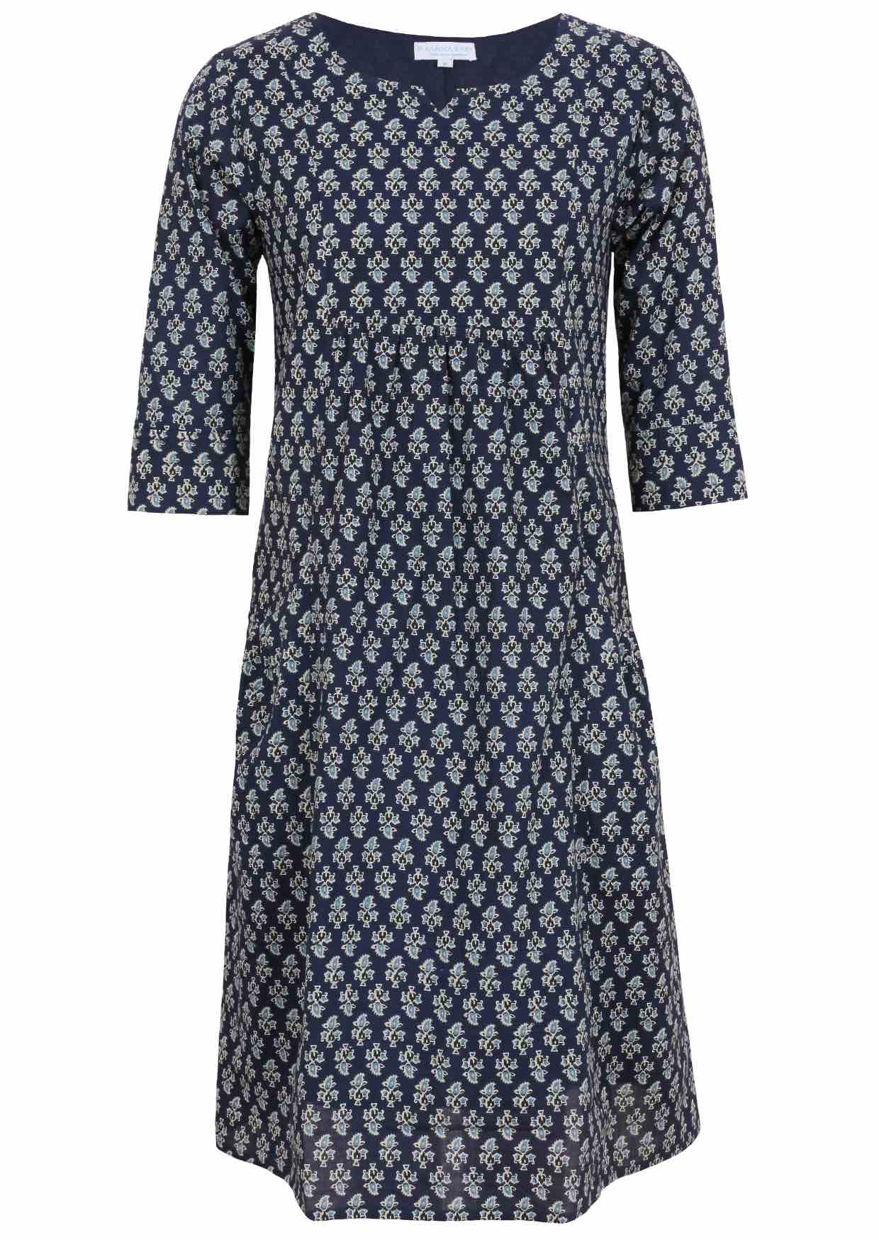 Relaxed fit below knee length cotton dress with 3/4 sleeves, pockets and round neckline.
