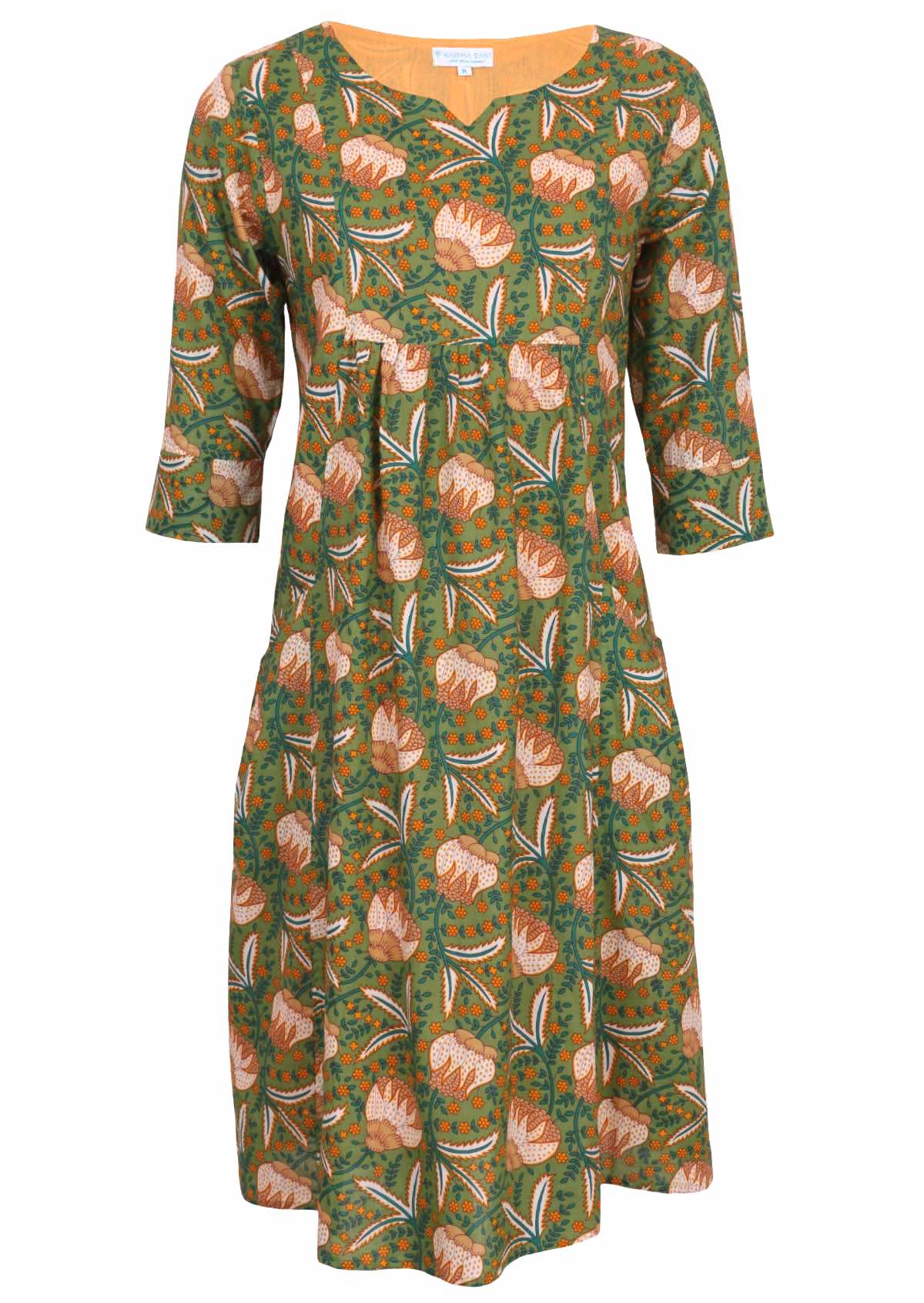 Cotton dress in Keisha print, of green, orange and yellow florals on a lighter green base