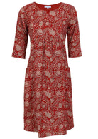 Relaxed fit below knee length cotton dress with 3/4 sleeves, pockets and round neckline.