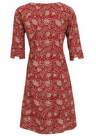Back view of 100% cotton dress with cuffed designer sleeves and deep pockets with pin tucks.