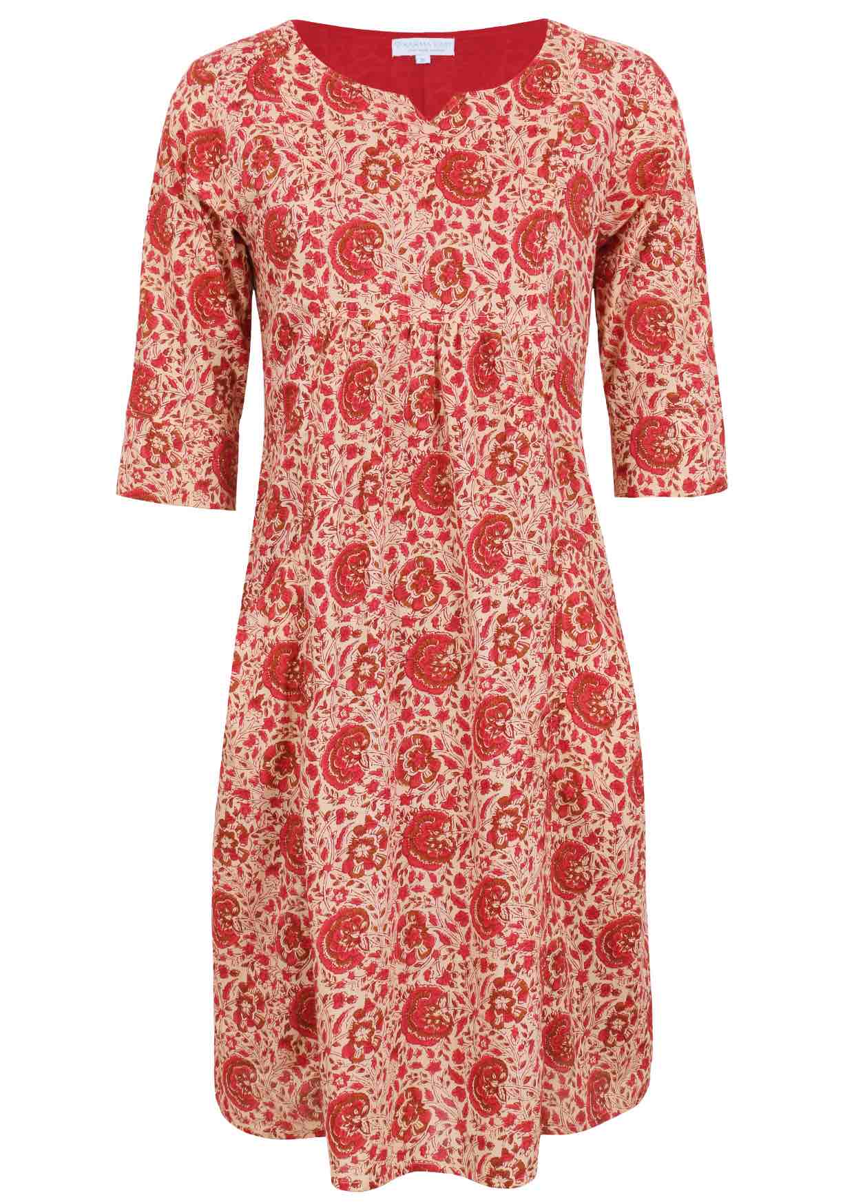 Relaxed fit below knee length cotton dress with 3/4 sleeves, pockets and round neckline.