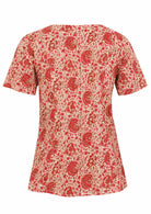 Back view of 100% cotton short sleeved relaxed fit cotton top with round neckline, pockets and gathers under the bust