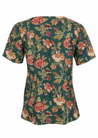 Back view of 100% cotton short sleeved relaxed fit cotton top with round neckline, pockets and gathers under the bust