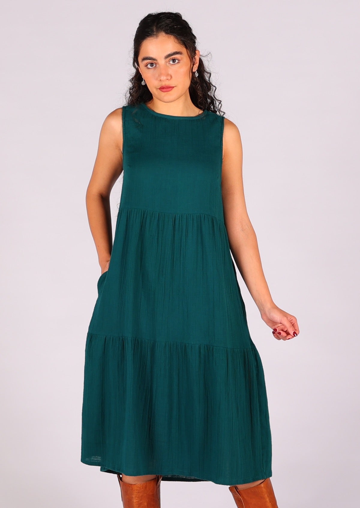 Lightweight cotton gauze makes up this dress that is perfect for the warm days, and can be layered for the cool