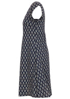 Side view of 100% cotton knee length navy blue floral print dress with cap sleeves, round neckline and fitted bodice