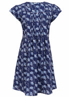 Front mannequin photo of cotton above knee dress in navy blue based floral print.