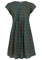 Front mannequin photo of cotton above knee dress with floral motifs in a bottle green base. 