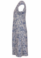 White based blue floral print cotton dress on a white background.