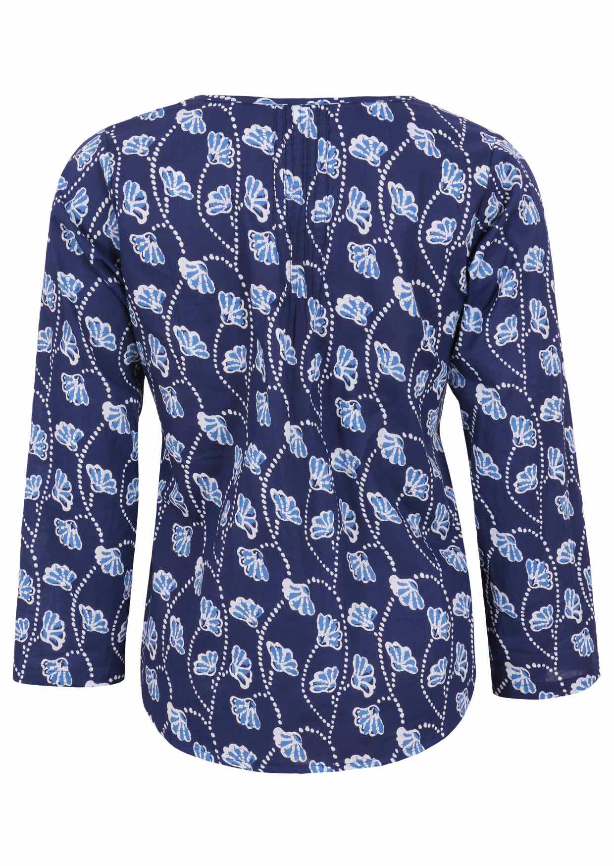 Back image of long sleeve cotton top with navy blue based floral print.
