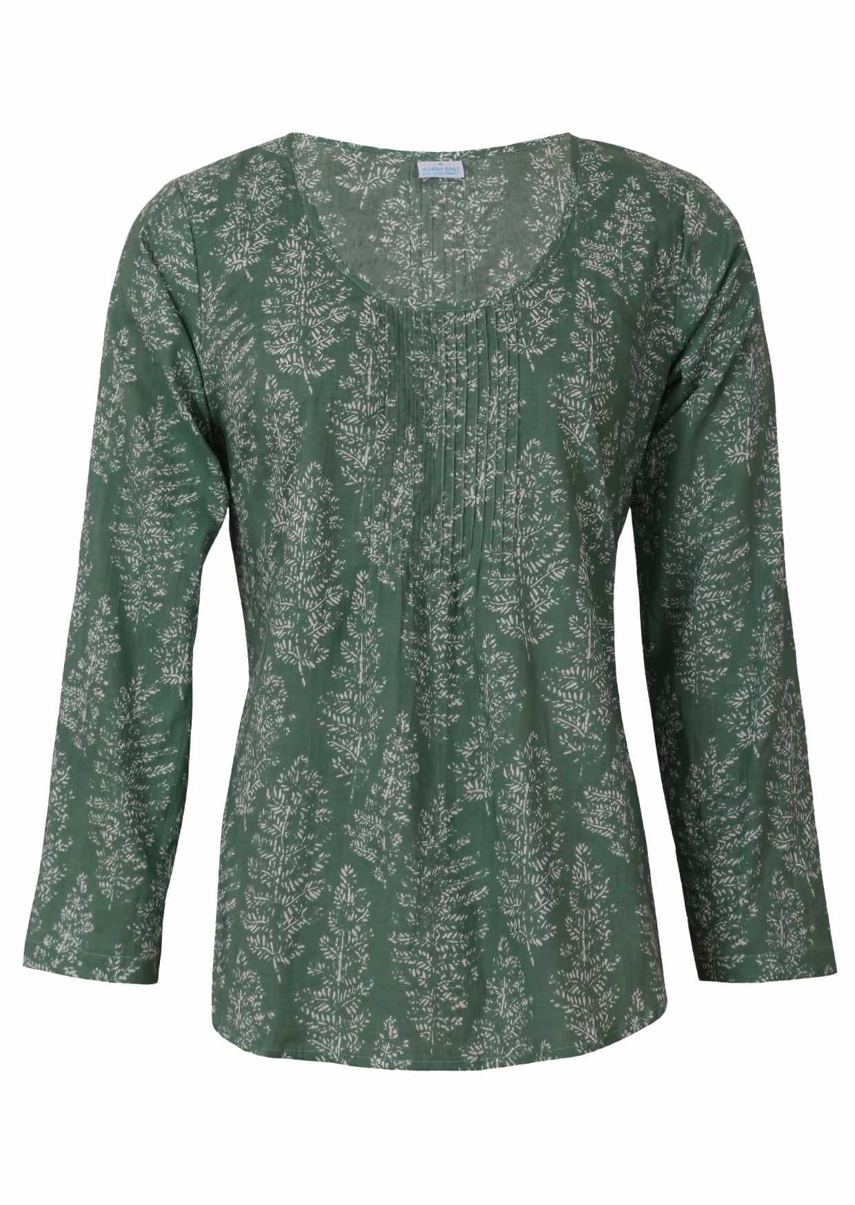 Lightweight 100% cotton top showcasing a simple round neckline, long sleeves and pleats across the bodice.